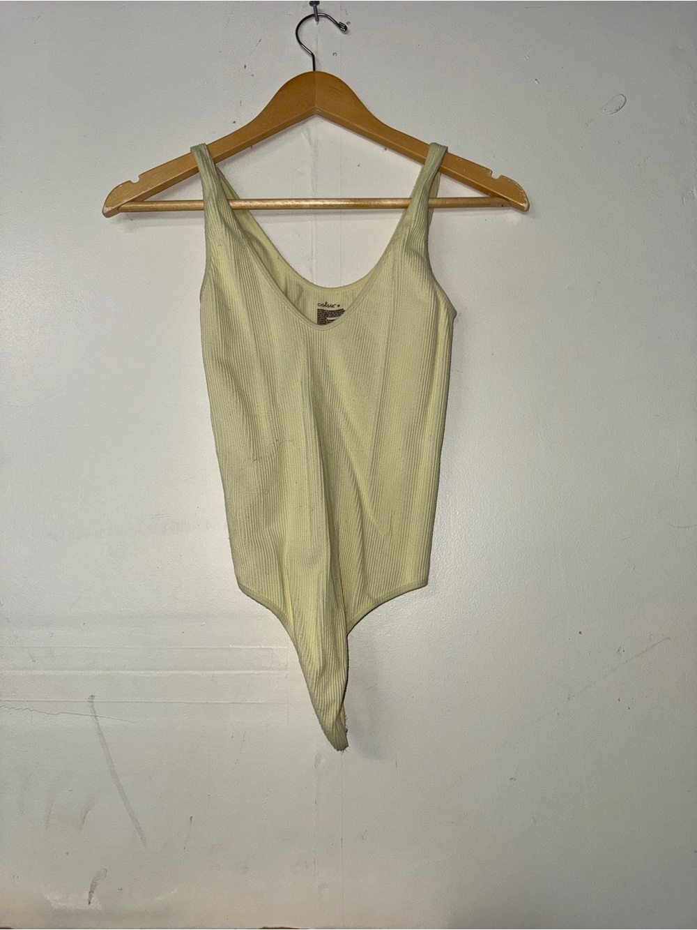 Colsie Ribbed One-Piece Bodysuit in Pale Yellow
